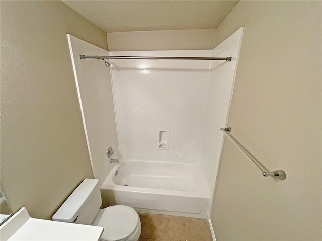 bathroom with shower / tub combination and toilet