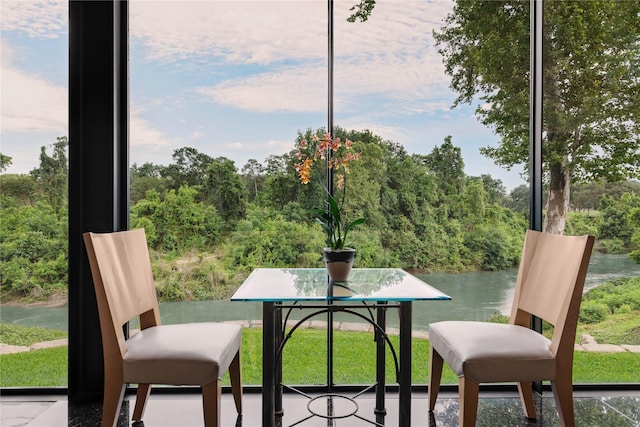 balcony featuring a water view