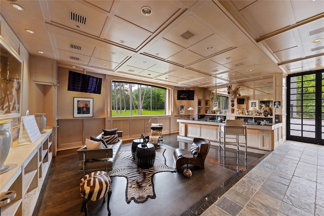 dining area with coffered ceiling and visible vents