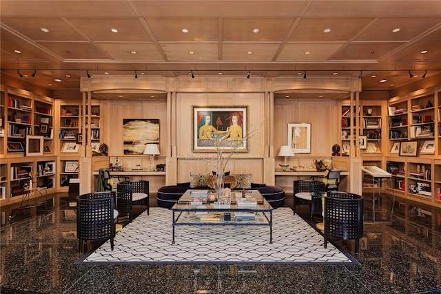 wine cellar featuring built in features, recessed lighting, coffered ceiling, and granite finish floor