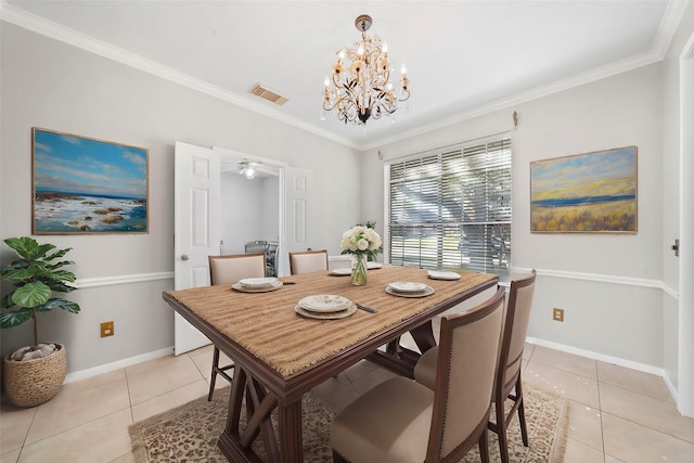 tiled dining area with crown molding and a notable chandelier