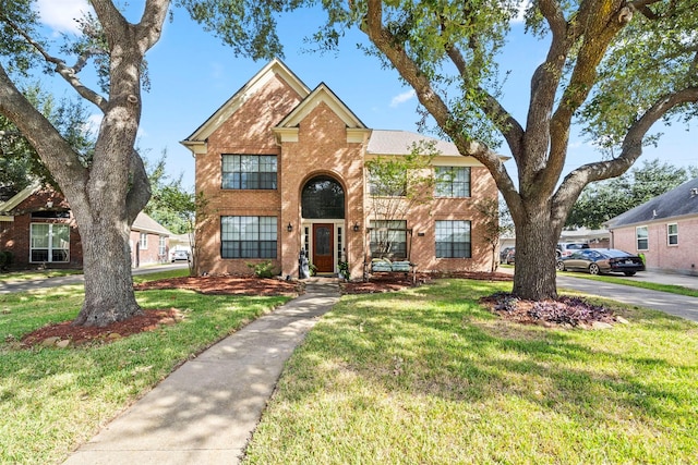 view of front of home featuring a front yard