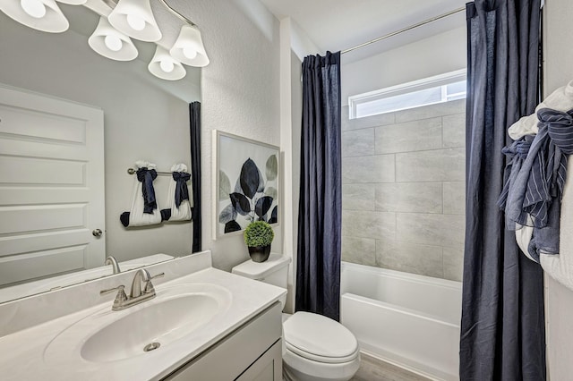 full bathroom with toilet, vanity, and shower / bathtub combination with curtain