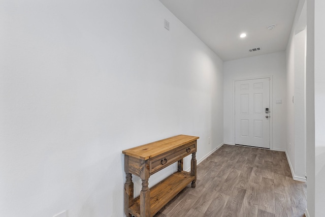 doorway featuring light hardwood / wood-style floors