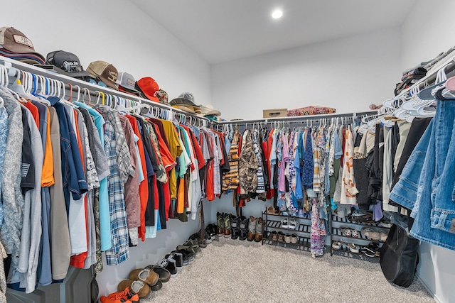 spacious closet with carpet floors