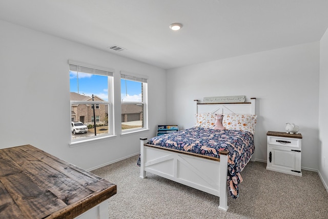 bedroom featuring carpet