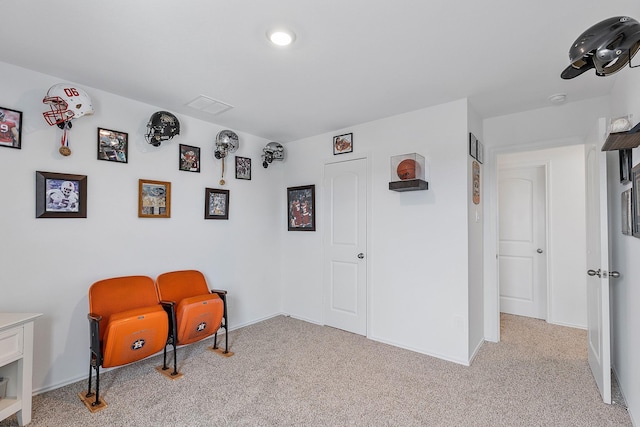 sitting room with light carpet