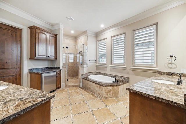 bathroom featuring tile patterned flooring, vanity, crown molding, and plus walk in shower