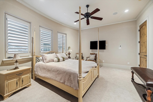 bedroom featuring multiple windows, crown molding, light colored carpet, and ceiling fan