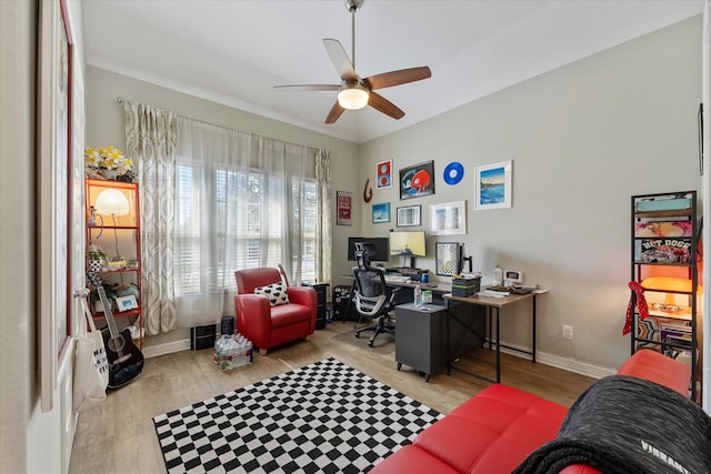 home office with ceiling fan and light wood-type flooring