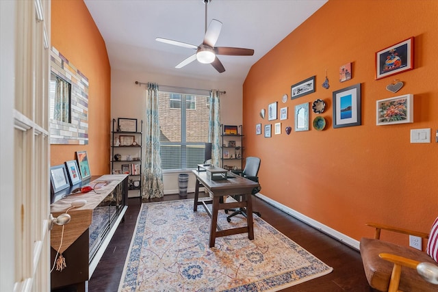 office area featuring dark wood-type flooring, vaulted ceiling, and ceiling fan