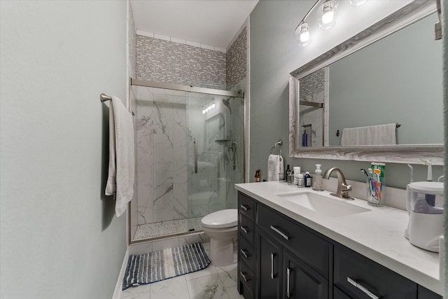 bathroom with a shower with door, vanity, and toilet