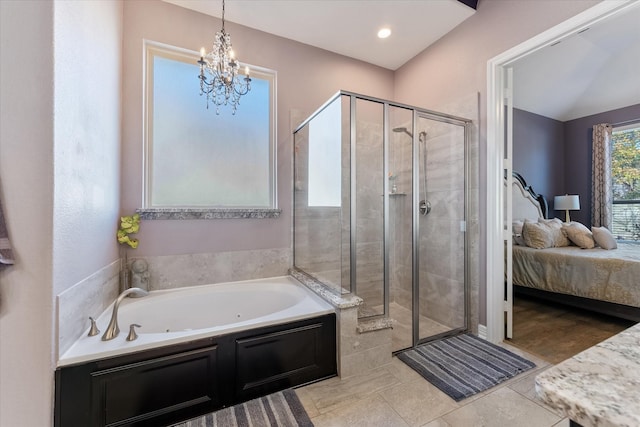 bathroom with independent shower and bath, tile patterned flooring, and a notable chandelier