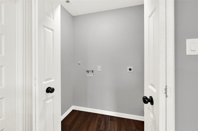 laundry area with wood-type flooring, hookup for a washing machine, and electric dryer hookup