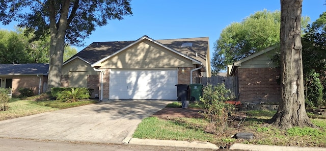 single story home with a garage