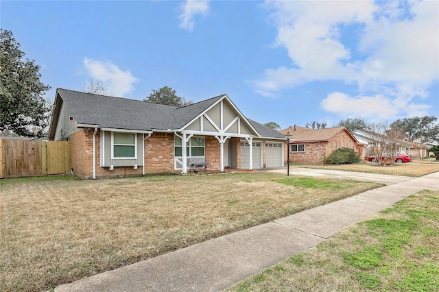 view of front of home featuring a garage and a front yard