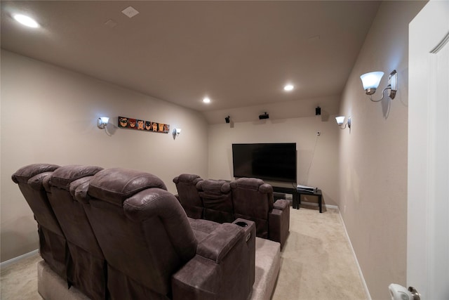 home theater featuring light carpet