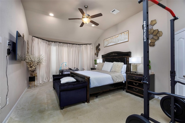 carpeted bedroom featuring vaulted ceiling and ceiling fan