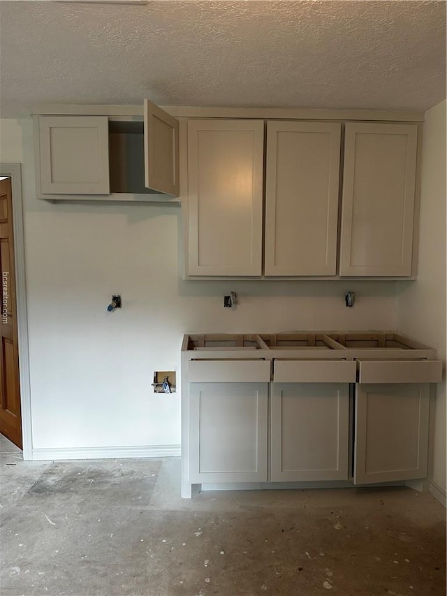 kitchen with a textured ceiling