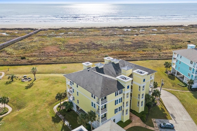 4241 Pointe W Dr Unit 301, Galveston, TX 77554 - drone / aerial view of waterfront with a beach