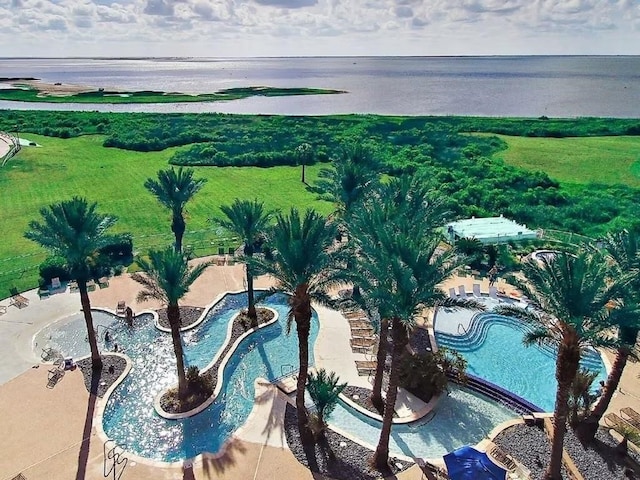 4241 Pointe W Dr Unit 301, Galveston, TX 77554 - bird's eye view of a pool and a nearby body of water
