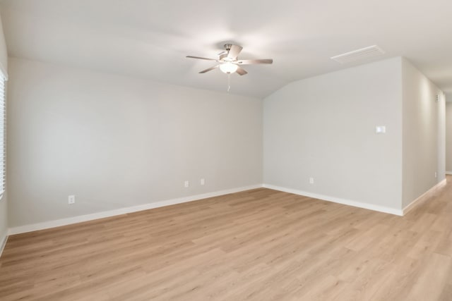 spare room with light hardwood / wood-style flooring and ceiling fan