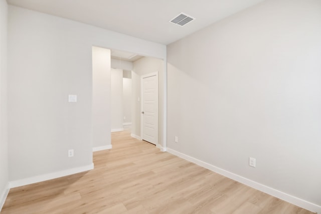 empty room with light wood-type flooring