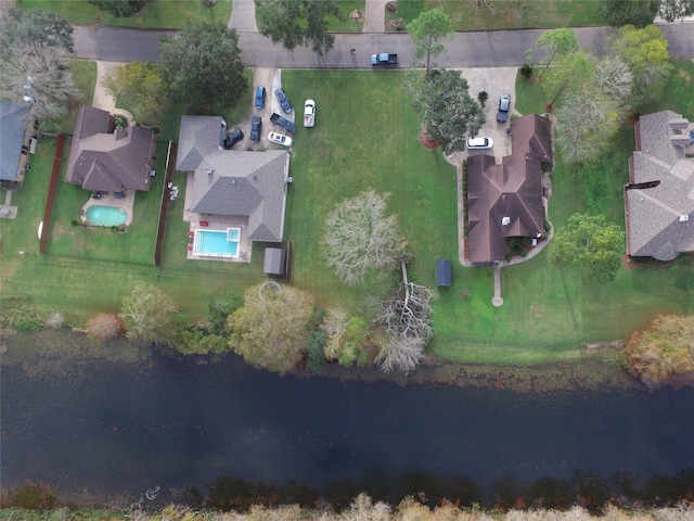 bird's eye view with a water view