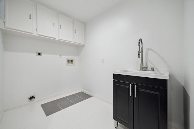 laundry area featuring sink, cabinets, hookup for a gas dryer, hookup for a washing machine, and hookup for an electric dryer