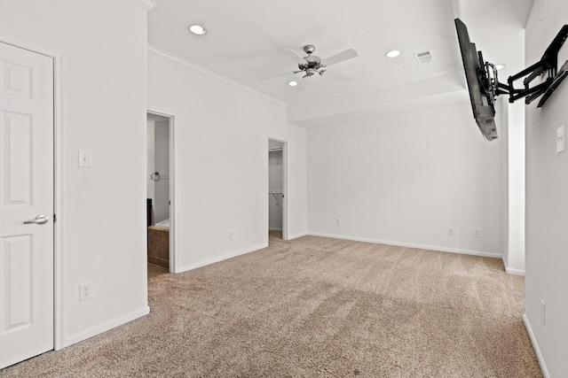 unfurnished bedroom with recessed lighting, carpet, visible vents, crown molding, and baseboards