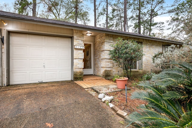 single story home featuring a garage