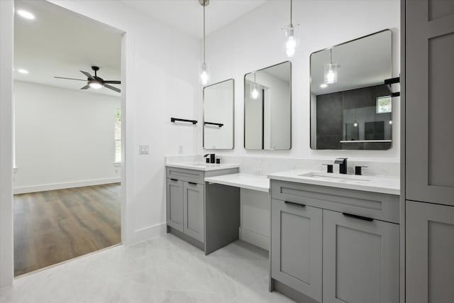 bathroom featuring vanity and ceiling fan