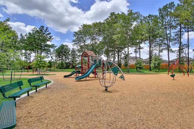 view of playground featuring a lawn