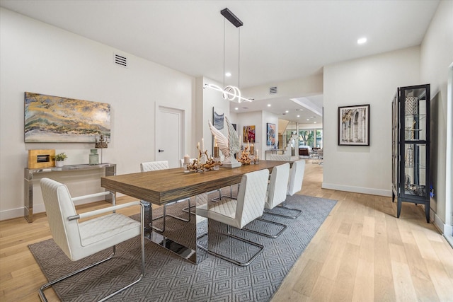 dining room featuring light wood-type flooring