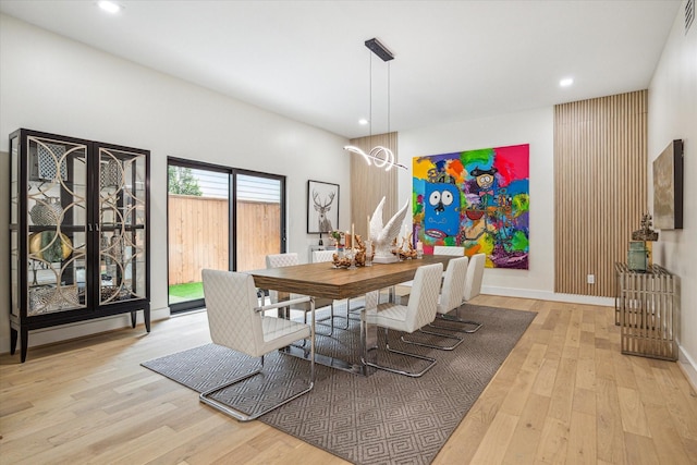 dining area with light hardwood / wood-style flooring