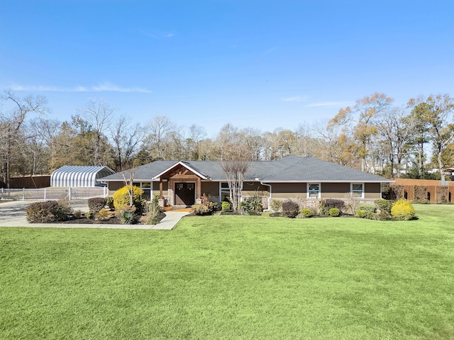 ranch-style house with a front yard