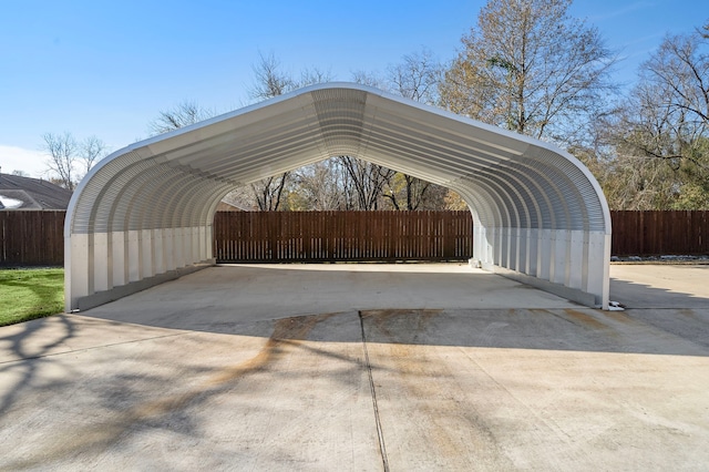 view of parking / parking lot with a carport