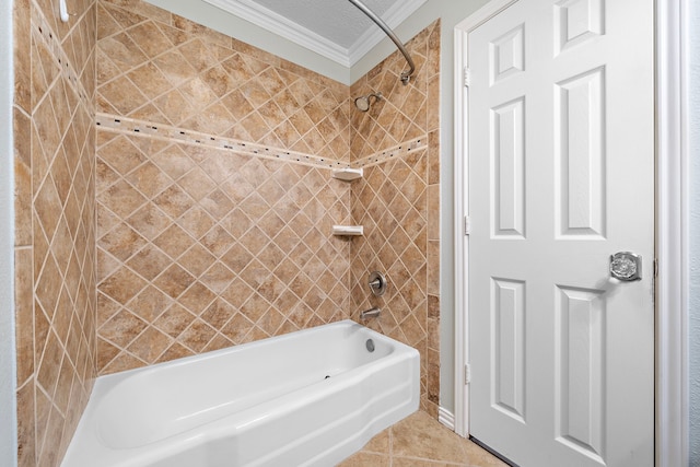 bathroom with tile patterned flooring, ornamental molding, and shower / bathtub combination