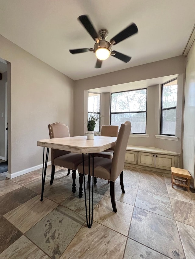 dining area featuring ceiling fan