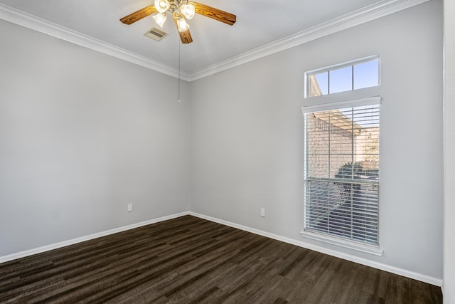 spare room with ornamental molding and ceiling fan