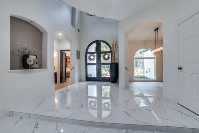 entryway featuring french doors