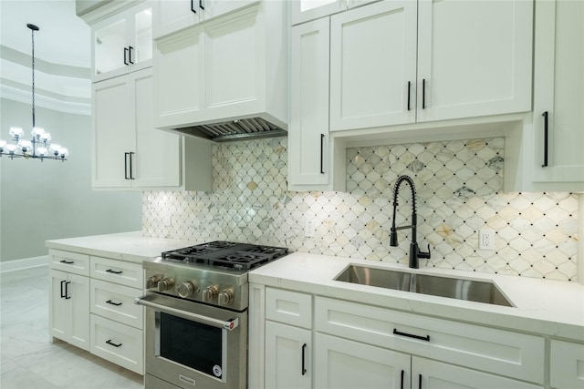 kitchen with sink, backsplash, high end range, custom exhaust hood, and hanging light fixtures