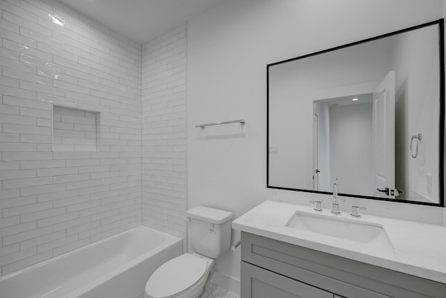 full bathroom with vanity, tiled shower / bath, and toilet