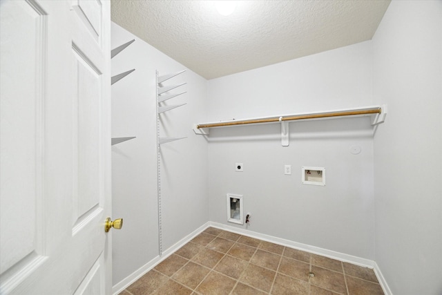 laundry room with electric dryer hookup, washer hookup, hookup for a gas dryer, and a textured ceiling