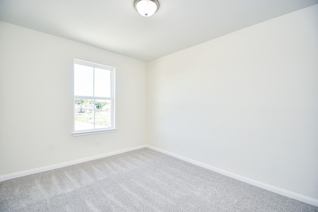 unfurnished room with carpet