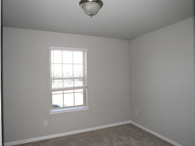 empty room with carpet flooring