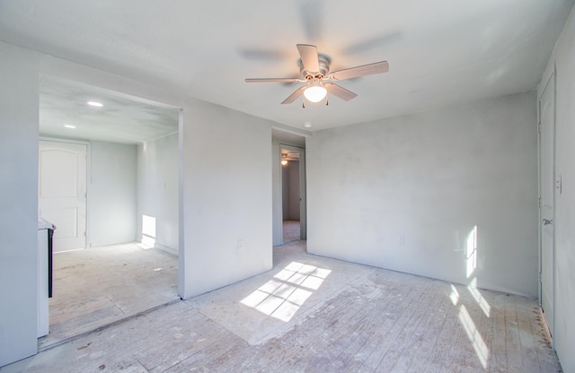 empty room featuring ceiling fan