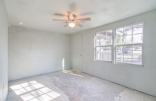 empty room featuring ceiling fan