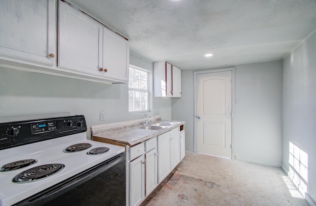 kitchen with white cabinets, sink, a textured ceiling, and electric range