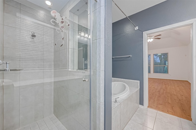 bathroom featuring independent shower and bath and tile patterned flooring